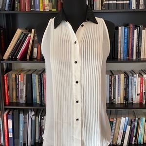 The limited dress button sleeveless shirt